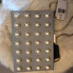 Beautiful Kate Spade Clutch with strap and pearls
